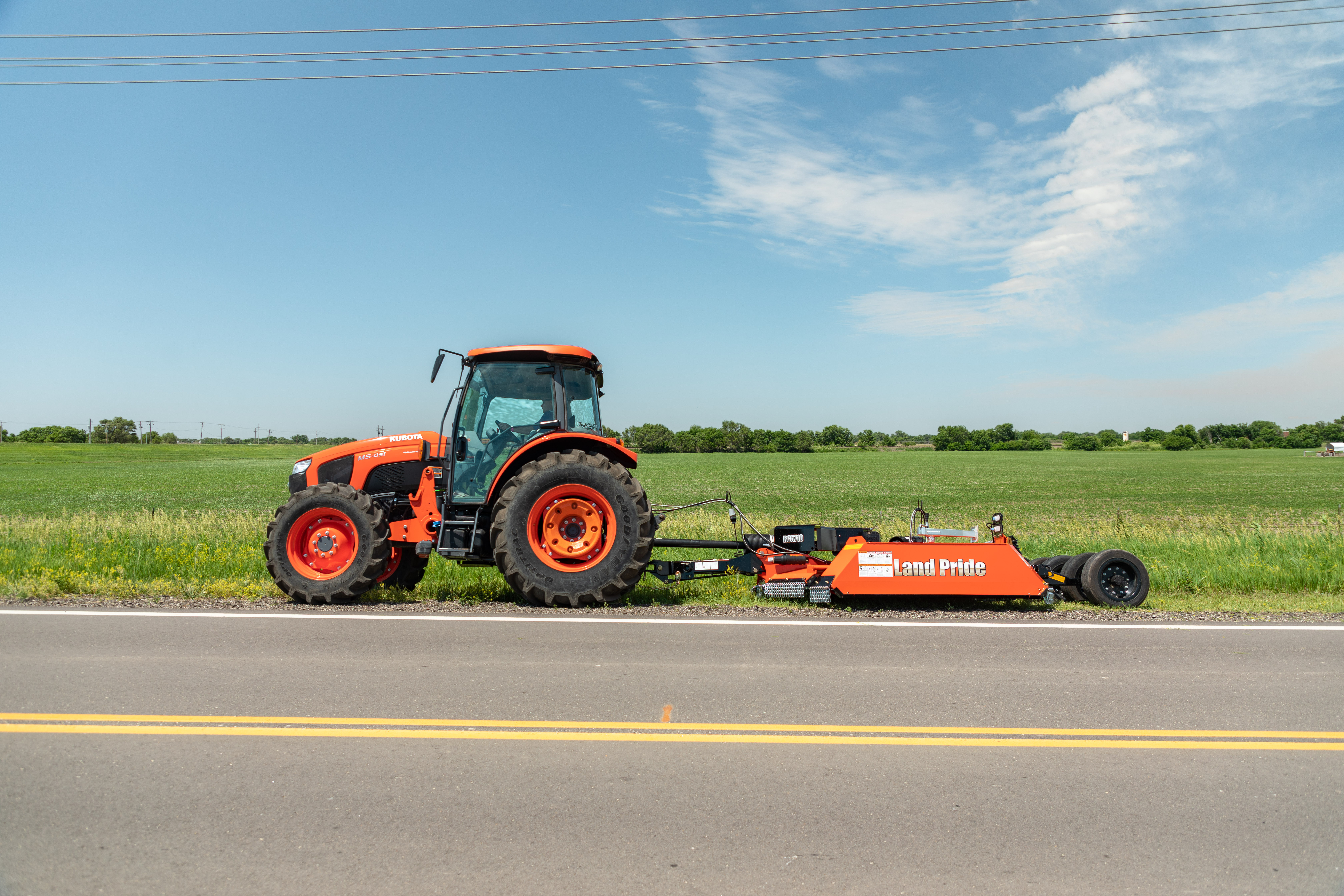 Kubota M5 towing Land Pride RC5710